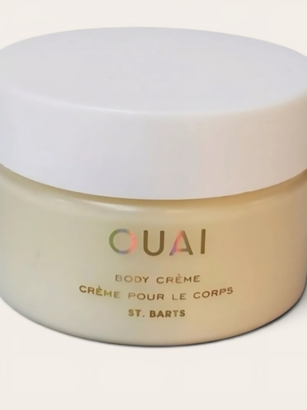 OUAI Body Crème in cream jar with white lid